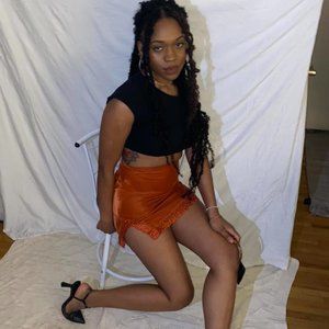 Tiny rust colored deadstock vintage mini skirt